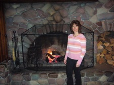 large fireplace with happy skier
